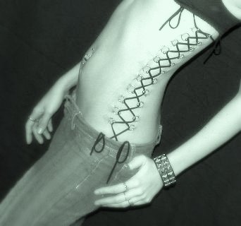 Corset piercing  by heavily medicated.jpg